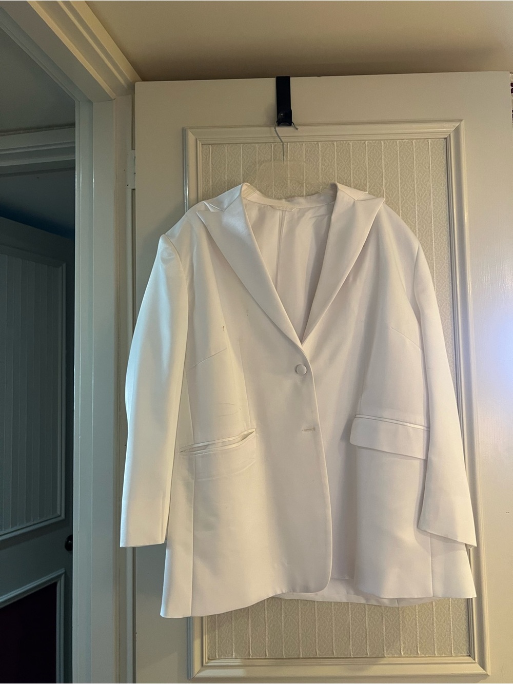 White Women's Single-Button Blazer Jacket with matching trouser.
